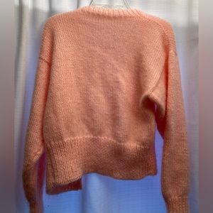 Very cute hand knitted pink sweater